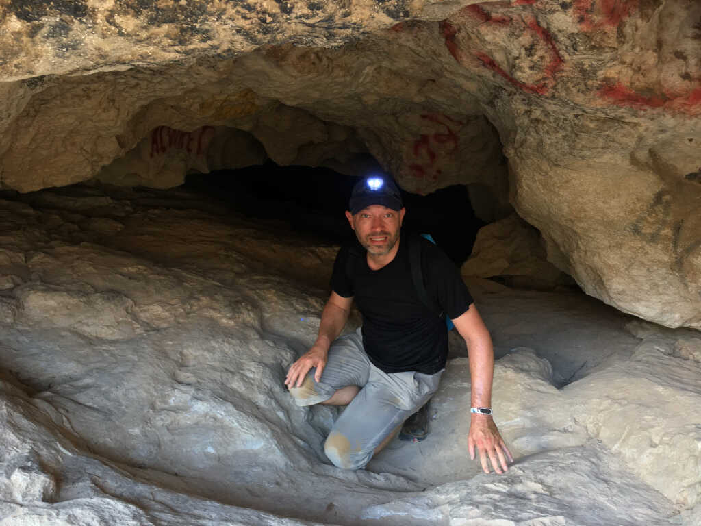 Volker at the entrance of Miqil Cave, Oman